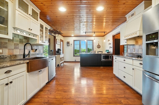 891 N Tecumseh Rd, Springfield, OH 45504 - kitchen featuring stainless steel appliances, tasteful backsplash, wood ceiling, dark wood finished floors, and white cabinets