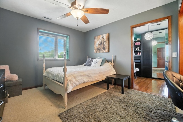 891 N Tecumseh Rd, Springfield, OH 45504 - bedroom featuring a ceiling fan and wood finished floors