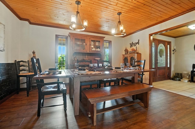 891 N Tecumseh Rd, Springfield, OH 45504 - dining room featuring crown molding, wooden ceiling, dark wood-style flooring, and a chandelier