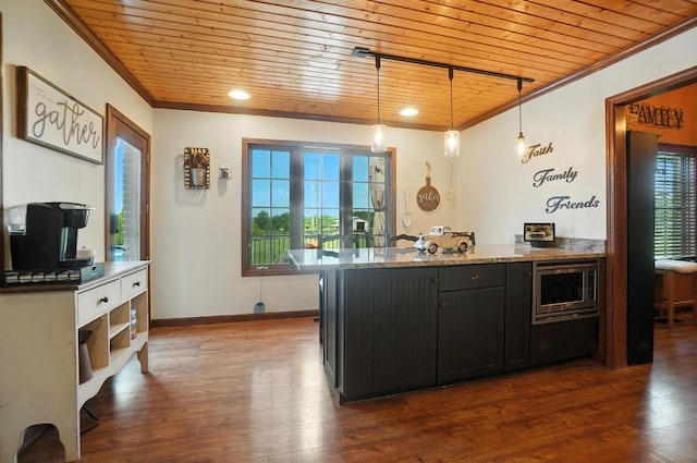 891 N Tecumseh Rd, Springfield, OH 45504 - kitchen with stainless steel microwave, wooden ceiling, ornamental molding, healthy amount of natural light, and a peninsula