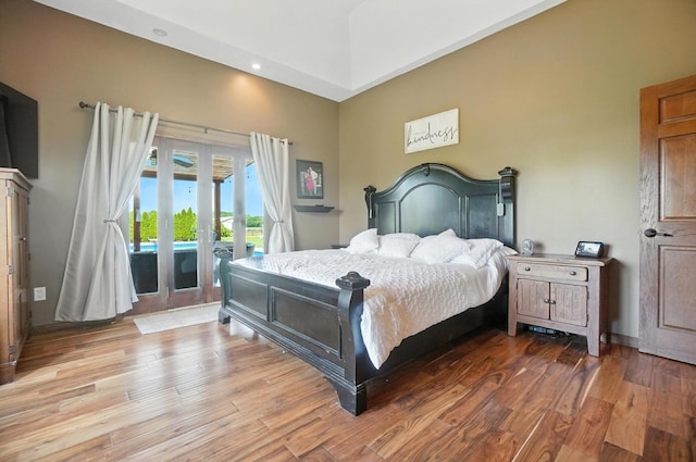 891 N Tecumseh Rd, Springfield, OH 45504 - bedroom featuring access to exterior, wood finished floors, and french doors