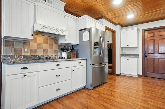 891 N Tecumseh Rd, Springfield, OH 45504 - kitchen featuring custom range hood, stainless steel refrigerator with ice dispenser, white cabinets, decorative backsplash, and wood ceiling