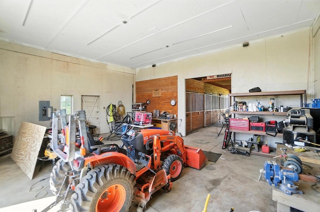 891 N Tecumseh Rd, Springfield, OH 45504 - garage featuring electric panel and a workshop area