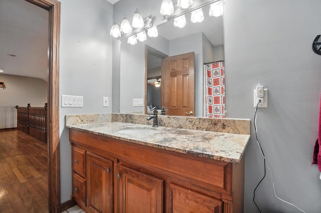 891 N Tecumseh Rd, Springfield, OH 45504 - full bath with vanity and wood finished floors