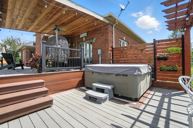 891 N Tecumseh Rd, Springfield, OH 45504 - wooden terrace featuring a hot tub and ceiling fan