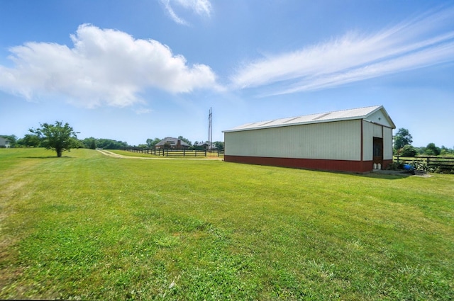 891 N Tecumseh Rd, Springfield, OH 45504 - view of yard featuring a pole building, an outbuilding, and a view of countryside