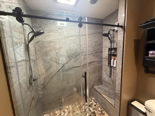 891 N Tecumseh Rd, Springfield, OH 45504 - bathroom with a stall shower and a textured ceiling