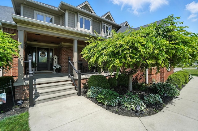891 N Tecumseh Rd, Springfield, OH 45504 - entrance to property featuring brick siding and covered porch