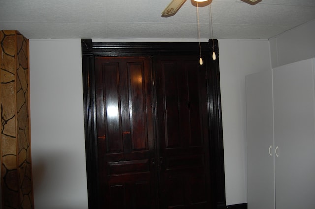 interior details with a ceiling fan