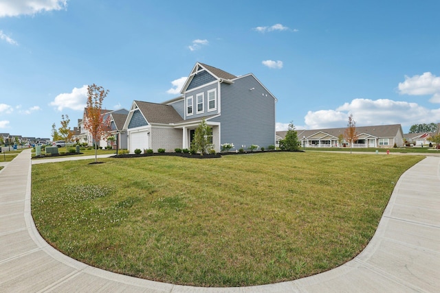 8202 Cherry Birch Dr, Tipp City, OH 45371 - view of property exterior with a yard, a garage, and a residential view