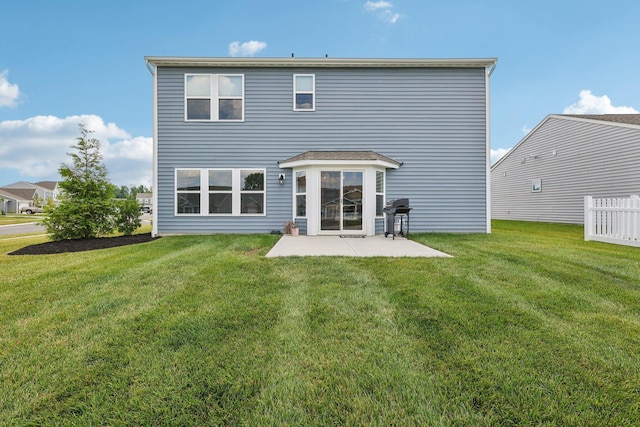 8202 Cherry Birch Dr, Tipp City, OH 45371 - rear view of house with a patio area and a yard