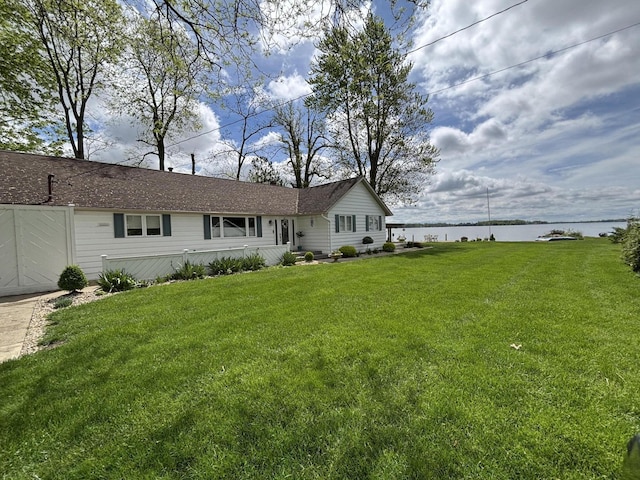 14072 Seminole Path, Lakeview, OH 43331 - back of property featuring a water view and a lawn