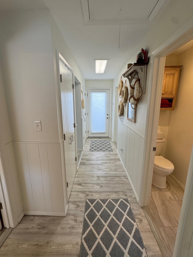 14072 Seminole Path, Lakeview, OH 43331 - hallway with light wood-style flooring and attic access