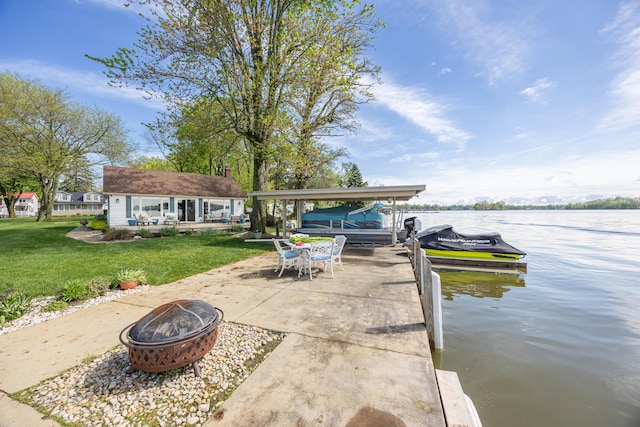 14072 Seminole Path, Lakeview, OH 43331 - dock area featuring a fire pit, a yard, a water view, and boat lift