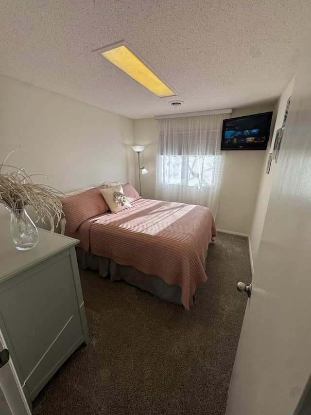 14072 Seminole Path, Lakeview, OH 43331 - carpeted bedroom with a textured ceiling