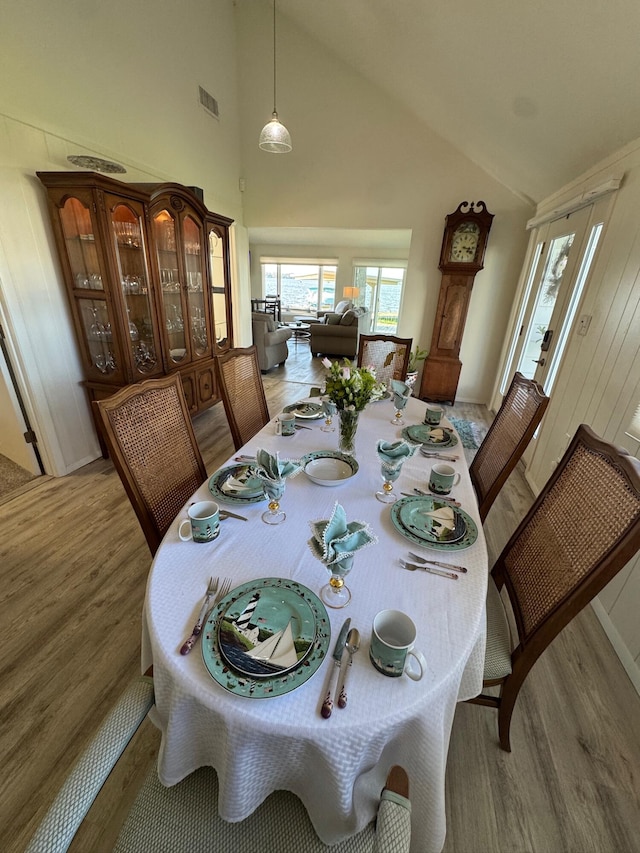 14072 Seminole Path, Lakeview, OH 43331 - dining space with light wood-type flooring and high vaulted ceiling