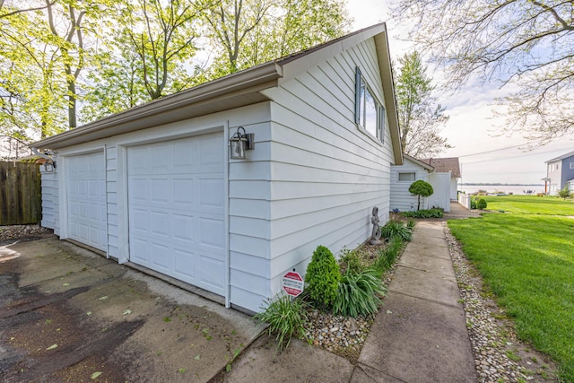14072 Seminole Path, Lakeview, OH 43331 - view of property exterior with a garage and a lawn