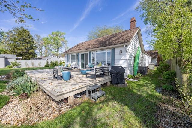 14072 Seminole Path, Lakeview, OH 43331 - back of house featuring a deck, a chimney, outdoor lounge area, and roof with shingles