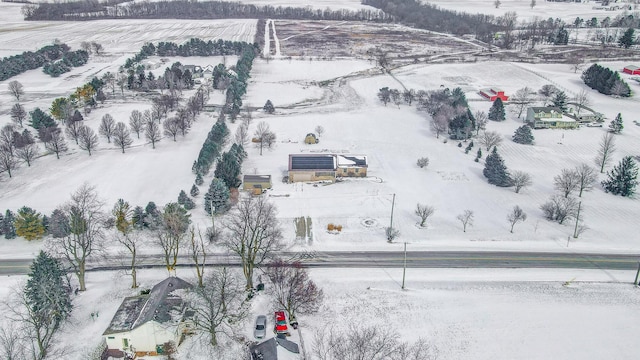 snowy aerial view with a rural view