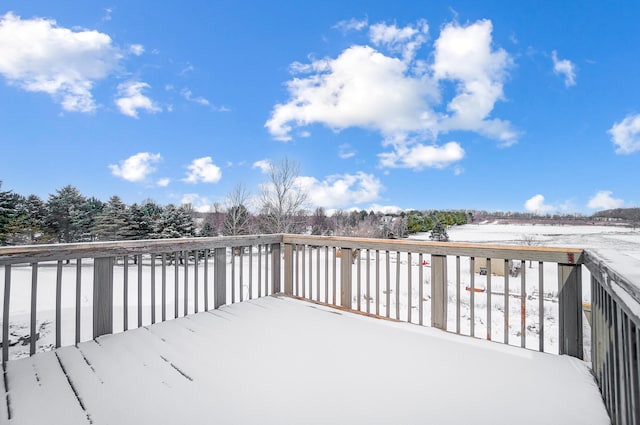 view of snow covered deck