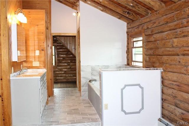 bathroom featuring log walls, vanity with extensive cabinet space, lofted ceiling with beams, tile floors, and a bath