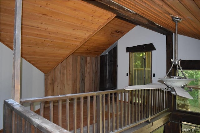 exterior space with vaulted ceiling and wooden ceiling