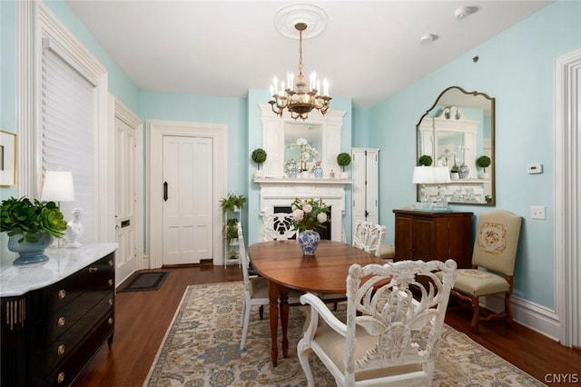 interior space featuring an inviting chandelier and dark hardwood / wood-style floors