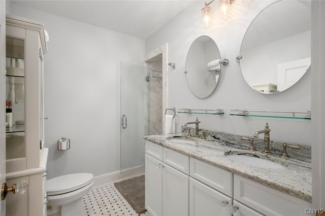 bathroom featuring a shower with door, tile flooring, toilet, and dual bowl vanity