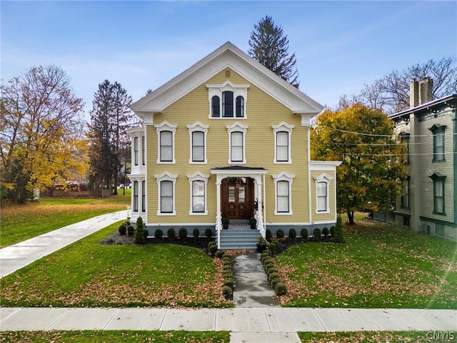 view of front of property with a front lawn