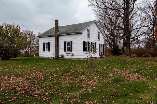 exterior space with a front yard