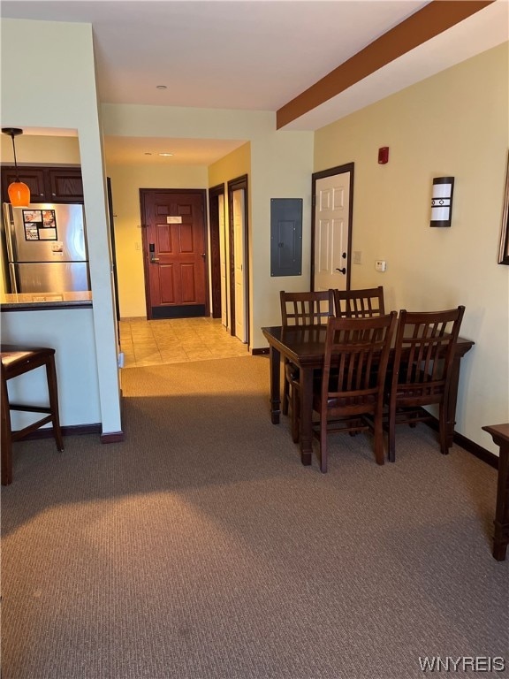 view of carpeted dining area