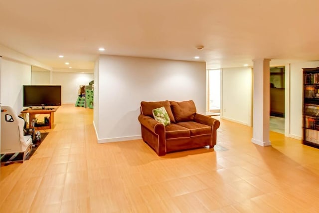 living room with light hardwood / wood-style floors