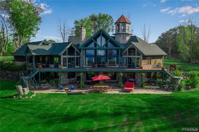 1567 Lake Rd, Porter, NY 14174 - back of house featuring a yard and a patio area