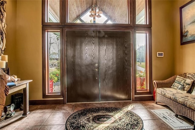 1567 Lake Rd, Porter, NY 14174 - foyer entrance with a chandelier and light tile floors
