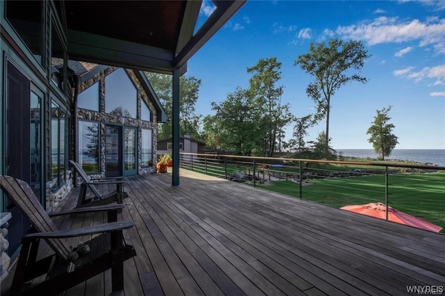 1567 Lake Rd, Porter, NY 14174 - wooden deck with a water view
