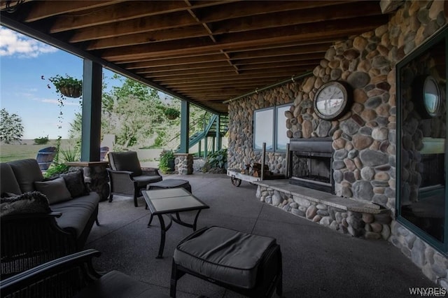 1567 Lake Rd, Porter, NY 14174 - view of patio with an outdoor living space with a fireplace