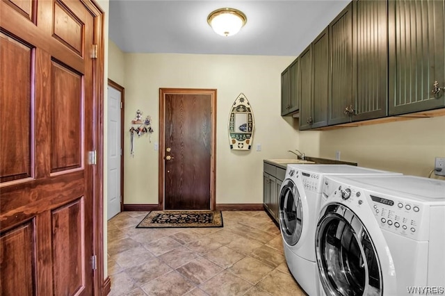 1567 Lake Rd, Porter, NY 14174 - laundry area with light tile floors, cabinets, and washer and clothes dryer