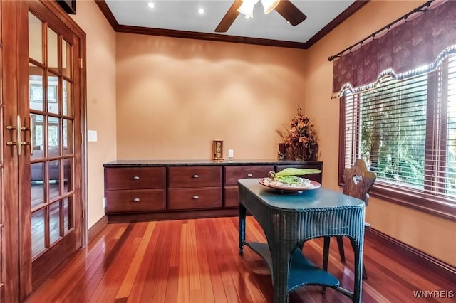 1567 Lake Rd, Porter, NY 14174 - dining space featuring ceiling fan, crown molding, plenty of natural light, and wood finished floors