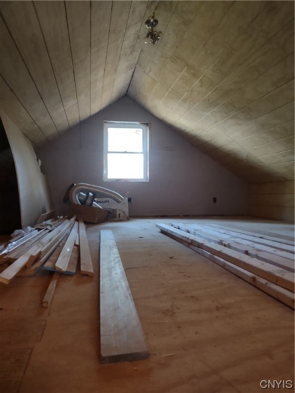 bonus room featuring wooden ceiling, hardwood / wood-style floors, and vaulted ceiling