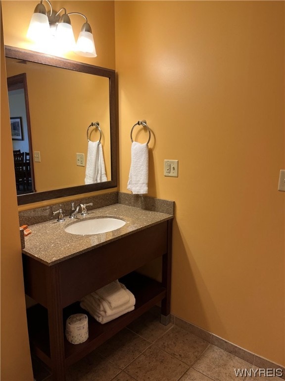 bathroom featuring vanity and tile flooring