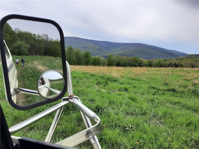 view of mountain feature featuring a rural view