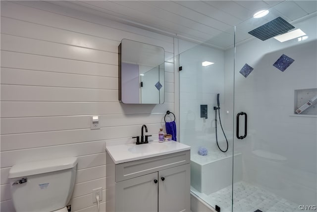 bathroom featuring walk in shower, toilet, and oversized vanity