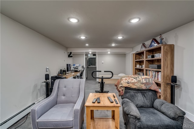 sitting room with hardwood / wood-style flooring