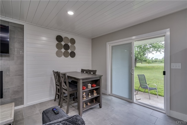 dining area featuring light tile flooring