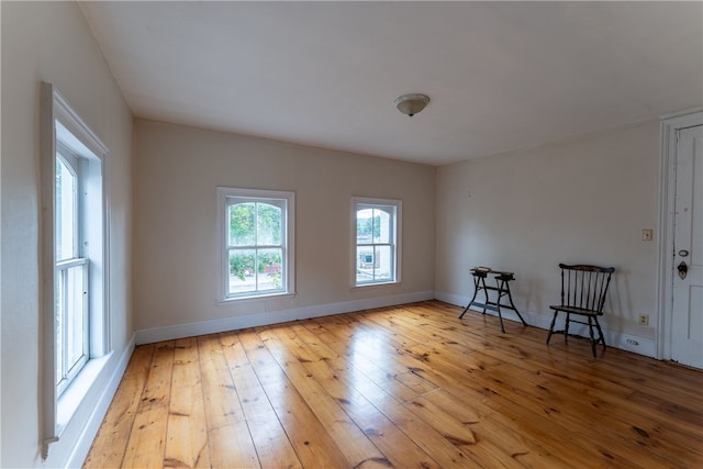 unfurnished room featuring light hardwood / wood-style floors