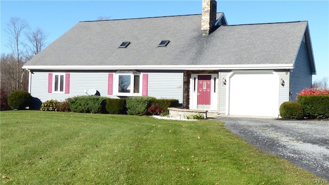 new england style home with a front lawn and a garage