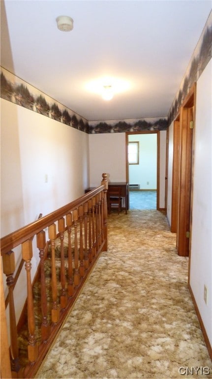 hallway with a baseboard heating unit