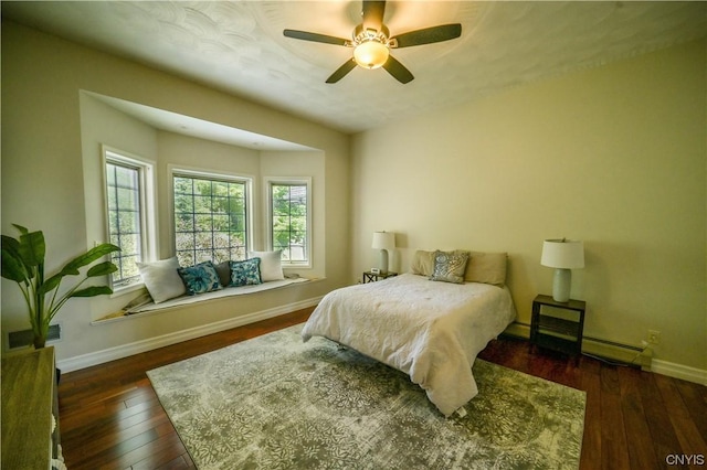 bedroom with dark wood-type flooring and ceiling fan