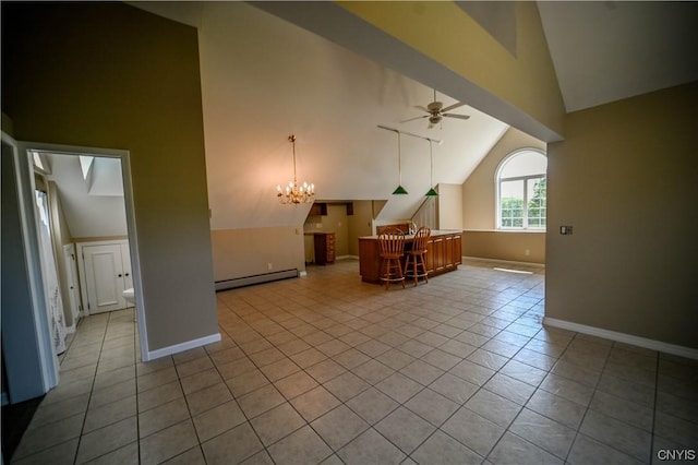 additional living space featuring ceiling fan with notable chandelier, a baseboard heating unit, high vaulted ceiling, and light tile patterned floors