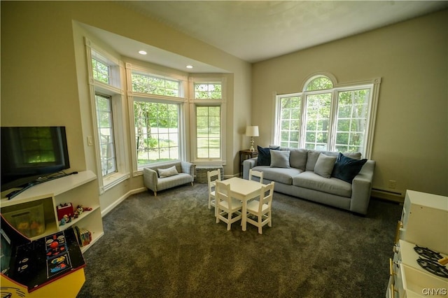 carpeted living room with a healthy amount of sunlight and a baseboard radiator